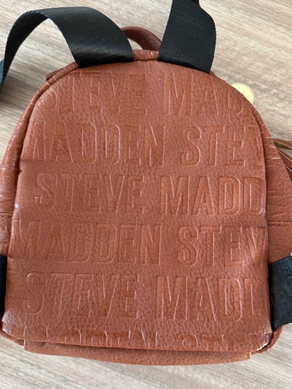 Steve Madden Cognac Faux-Leather Mini Backpack with Embossed Logo - Picture 9 of 10